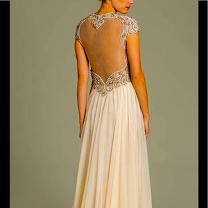 Elegant Jovani dress, style 78235. Color is Champagne. Size 12